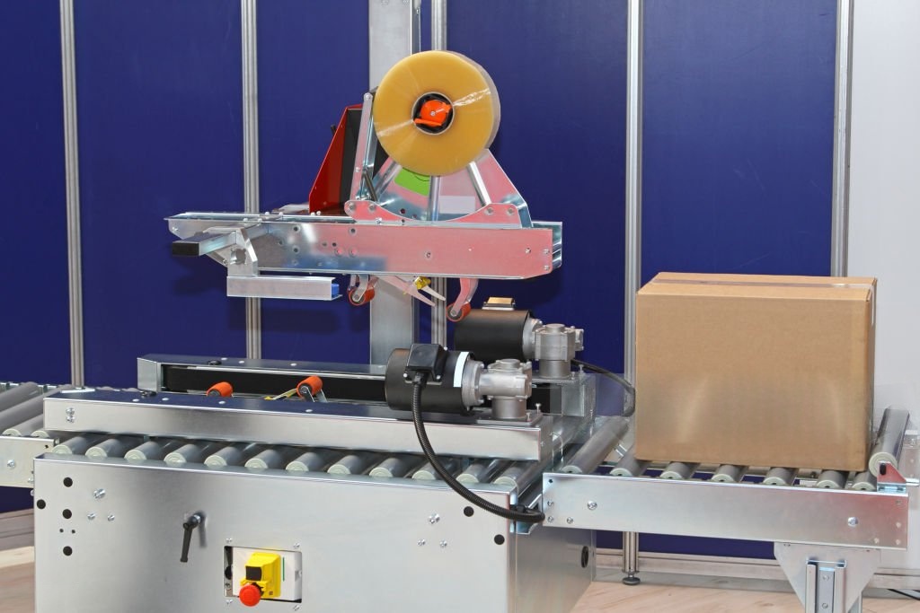 Hình 5. Máy dán thùng tự động - sealer